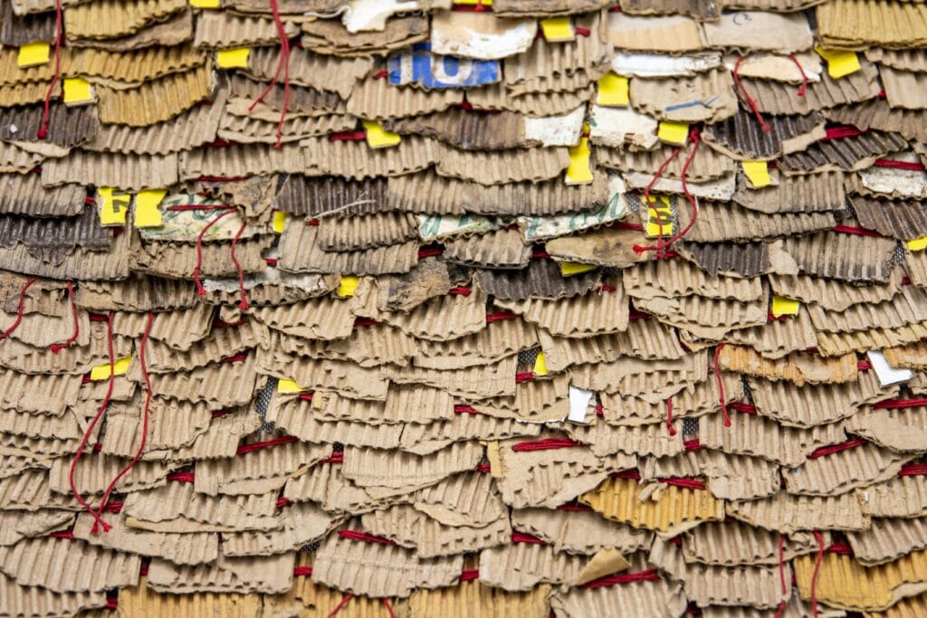 Photo by Magda Ehlers: https://www.pexels.com/photo/corrugated-paper-with-red-string-3636512/